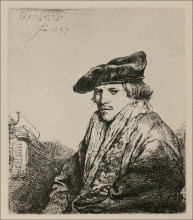 Репродукция картины "a young man seated, turned to the left" художника "рембрандт"