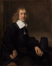 Картина "a young man at a table (possibly govaert flinck)" художника "рембрандт"
